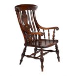 An elm, fruitwood and mahogany Windsor armchair