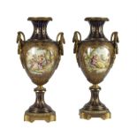 A pair of Sevres-style gilt-metal mounted pottery vases