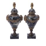 A pair of gilt metal mounted green Serpentine marble table lamps