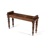 A Victorian oak hall bench