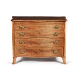 A George III mahogany and goncalo alves banded serpentine fronted chest of drawers