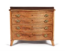 A George III mahogany and goncalo alves banded serpentine fronted chest of drawers