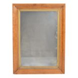 An early Victorian bird's-eye maple wall mirror