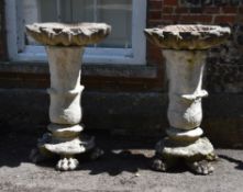 A pair of stone composition birdbaths