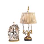 A German porcelain and gilt metal mounted twin light table lamp