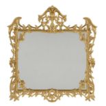 A carved giltwood wall mirror in George III style