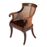 A Regency mahogany bergere armchair