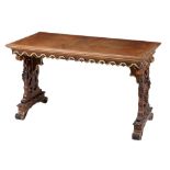 A Renaissance Revival walnut and parcel gilt library table