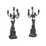 A pair of French patinated bronze