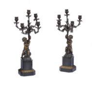 A pair of French patinated bronze