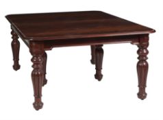 A mahogany extending dining table in early Victorian style