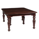 A mahogany extending dining table in early Victorian style