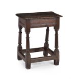 A Charles II oak joint stool