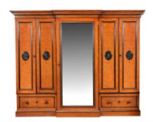 A Victorian figured walnut and parcel ebonised wardrobe