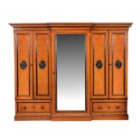 A Victorian figured walnut and parcel ebonised wardrobe