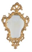 A pair of giltwood cartouche shaped mirrors