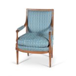 A Louis XVI beech and upholstered armchair