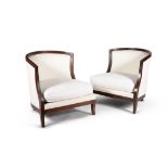 A pair of stained hardwood and upholstered corner chairs