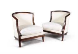 A pair of stained hardwood and upholstered corner chairs