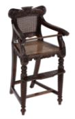 Y An Anglo-Indian carved rosewood child's high chair