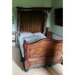 A mahogany half tester bed
