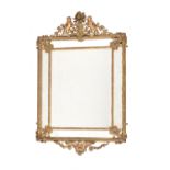 A giltwood and composition wall mirror in Regence style