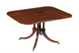 A mahogany breakfast table