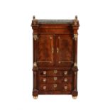 A Louis Phillipe mahogany and gilt metal mounted miniature cabinet