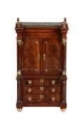 A Louis Phillipe mahogany and gilt metal mounted miniature cabinet