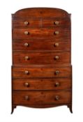 Y A late George III mahogany and ebony inlaid chest on chest