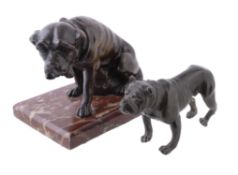 A patinated bronze model of a seated mastiff