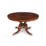 Y Y A Regency rosewood and brass inlaid circular centre table