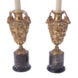 A pair of gilt metal and marble mounted urn table lamps