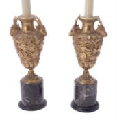 A pair of gilt metal and marble mounted urn table lamps