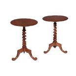 A companion pair of Victorian mahogany tripod occasional tables