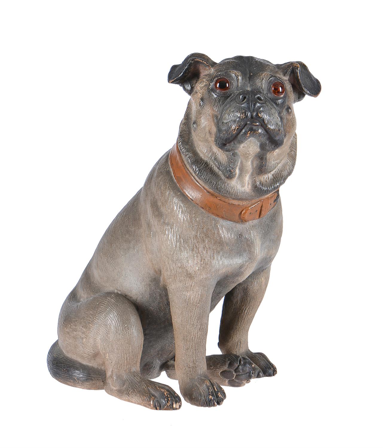 An Austrian cold painted terracotta model of a seated pug