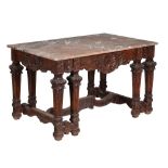 A French carved oak and marble topped centre table