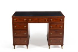 A Regency mahogany twin pedestal desk