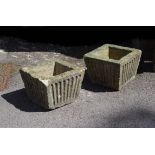 A pair of English stone planters