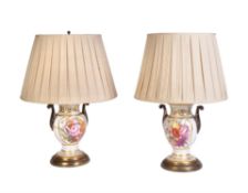 A pair of English porcelain gilt-metal mounted two-handled vases fitted as lamps