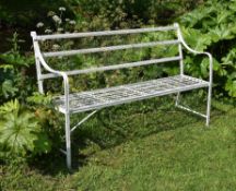 A Regency white painted wrought and cast iron garden seat