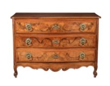 A Continental figured walnut commode