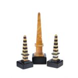 A pair of striped marble desk obelisks in the style of Grand Tour souvenirs