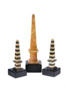 A pair of striped marble desk obelisks in the style of Grand Tour souvenirs