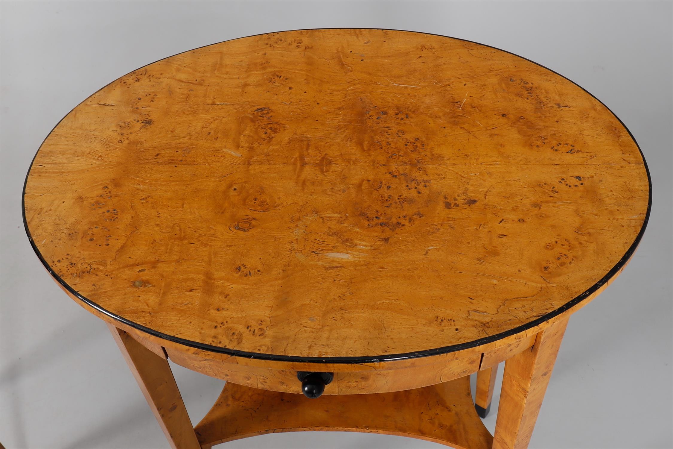 A late 19th century Biedermeier Revival birch and part ebonised two tier single drawer oval occasion - Image 5 of 5