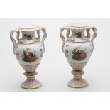 A pair of late 19th century Meissen pedestal urn shaped vases