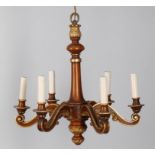 A mahogany and parcel gilt six light chandelier
