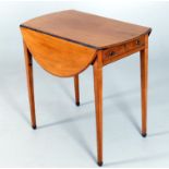 A George III oval faded mahogany Pembroke table