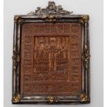 A Gothic style carved boxwood panel carved with the crucifixion