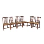 A set of six mahogany dining chairs in the early George III Gothic style